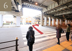 Cross the street at the pedestrian crossing and head right.